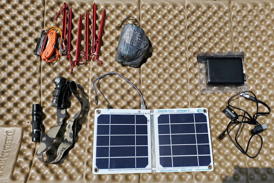 Which lightweight power bank for solar panel in backpack? Survivalist